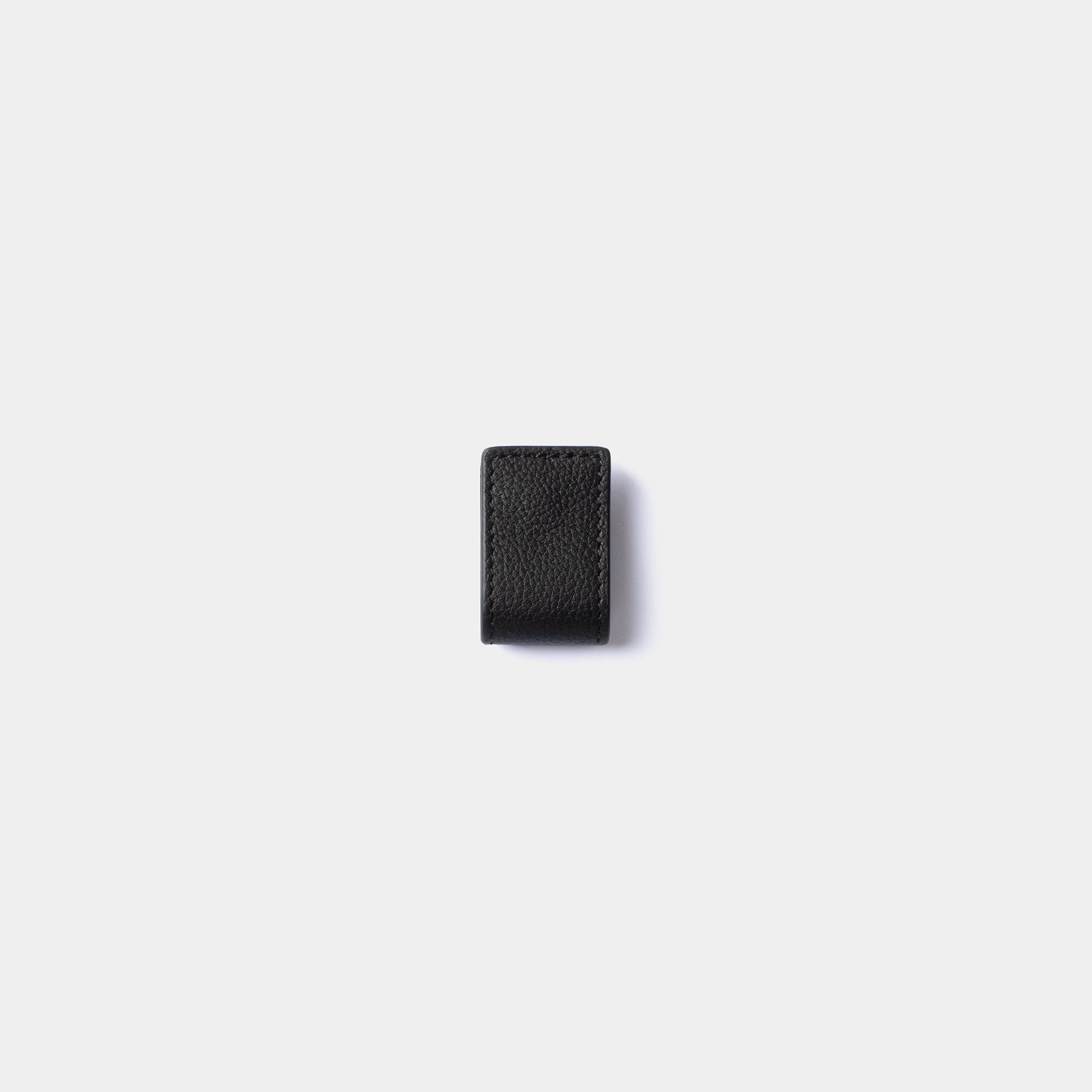 Miguel Bellido Accesorios funcionales Organizador de cables negro