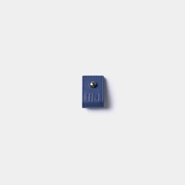 Miguel Bellido Accesorios funcionales Organizador de cables porta cavi in pelle blu