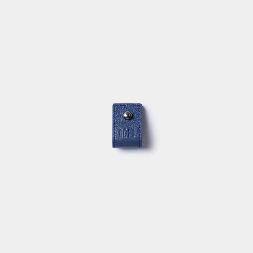 Miguel Bellido Accesorios funcionales Organizador de cables porta cavi in pelle blu
