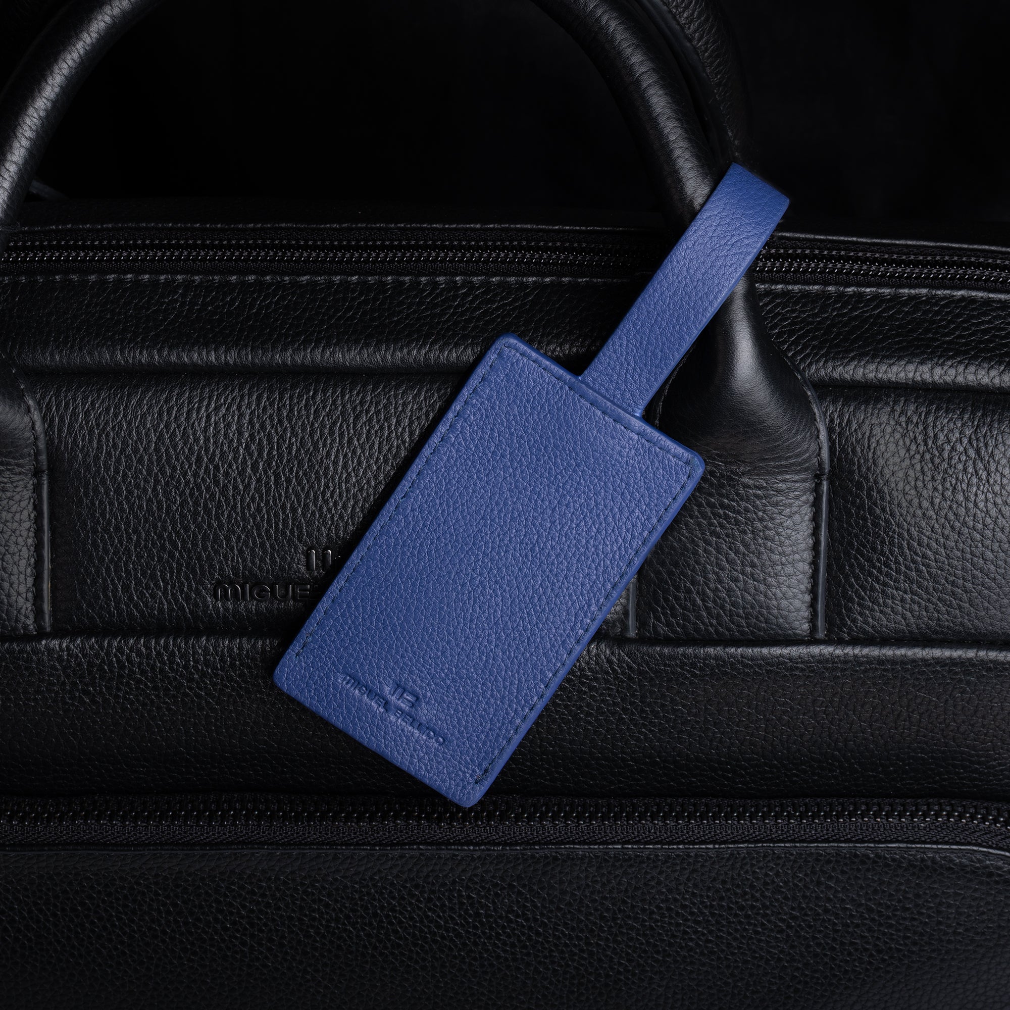 Miguel Bellido Accesorios funcionales identificatore bagaglio blu in pelle